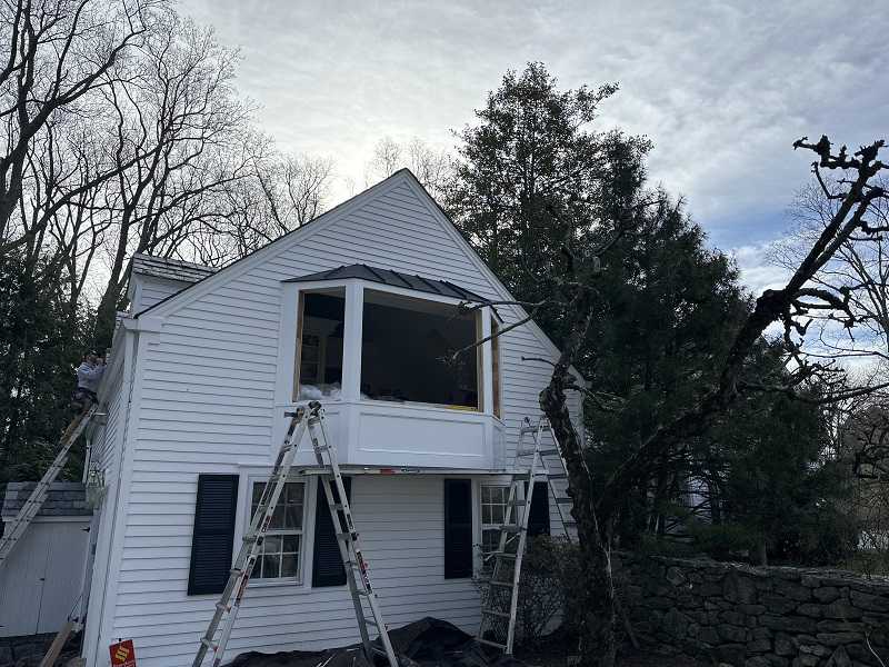 Scaffolding set up underneath this bay window during window installation in Norwalk,CT